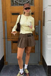 buckle-detail-pleated-mini-skirt